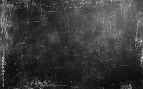 Chalk rubbed out on blackboard background. 