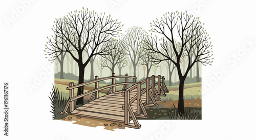 Wooden bridge arches over a path amidst misty trees in autumn