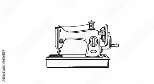Vintage sewing machine with a spool of thread and a hand crank