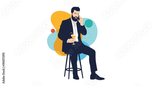 Stylish bearded man in a dark suit sitting on a high stool while talking on a smartphone and holding a refreshing yellow cocktail.
