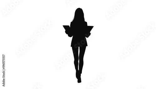 Elegant lady silhouette in a long coat carries a handbag while walking directly toward the viewer.