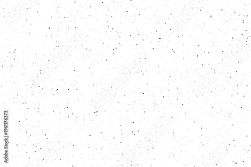 Random small black dots and fine specks create an uneven texture on a pure white plane