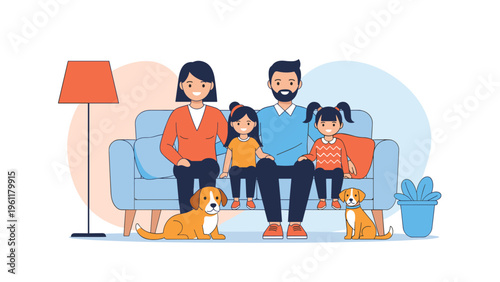 Happy family of four sits together on a blue sofa in a cozy living room with their two loyal pet dogs on the floor.