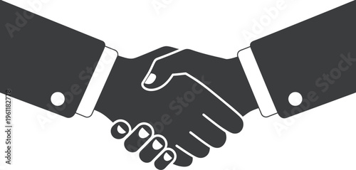 Two silhouetted business suits shake hands firmly in a classic gesture symbolizing agreement, partnership, or a finalized deal.