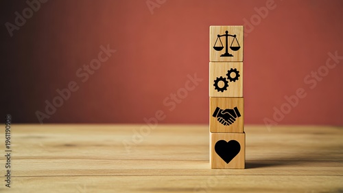 Stacked wooden blocks with justice and value icons balance and ethics concept