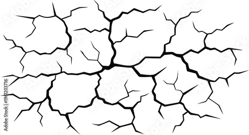 Black cracked ground texture with spreading fissures