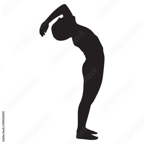 A person practices a backbend yoga pose dramatically arched and shown as a silhouette