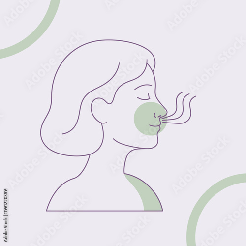 Woman breathing deeply with closed eyes and gentle smile.