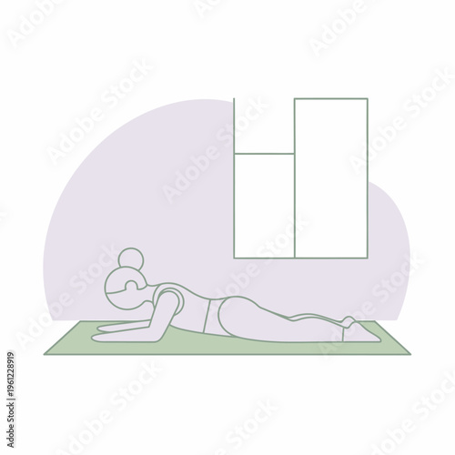Woman performing Sphinx pose on yoga mat indoors.