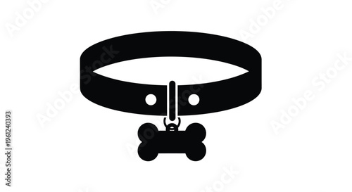 Black dog collar with bone shaped tag a stark silhouette