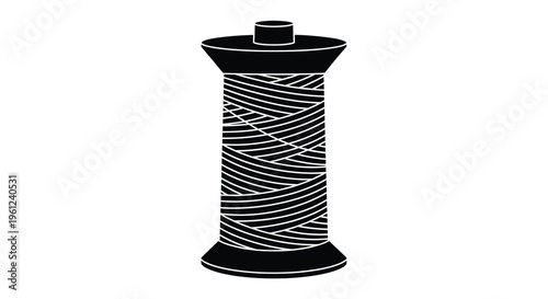 Black spool of thread with winding lines a striking silhouette