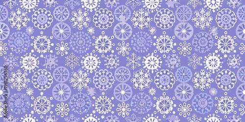 Seamless pattern of delicate white snowflakes on a vibrant purple background