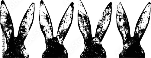 Four black silhouettes of rabbit heads with tall ears in a row on white background