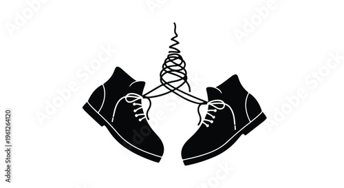Black shoes tied together with laces