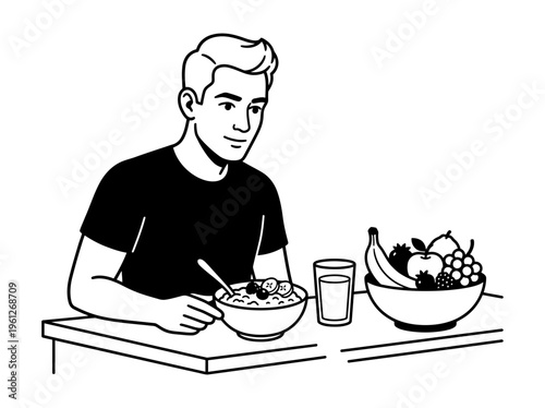 Wheelchair user working at computer desk in inclusive workspace