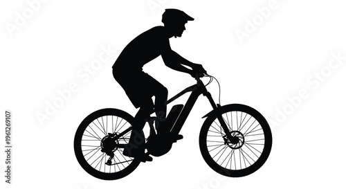 Mountain biker riding a bicycle a striking black silhouette