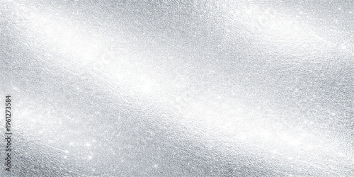 Fresh water drops on a window create a cold winter nature texture with blue frozen ice patterns and a clean liquid splash backdrop