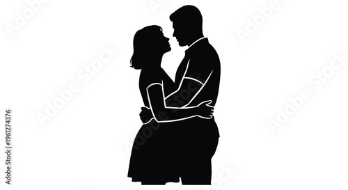 Couple embracing tenderly in a striking black silhouette