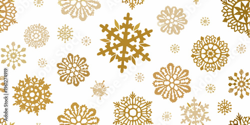 Golden snowflakes scattered across a bright white background texture