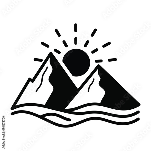 Black silhouette of mountains with sun rising over water