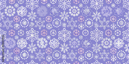 Intricate purple and white snowflake pattern covering the entire frame