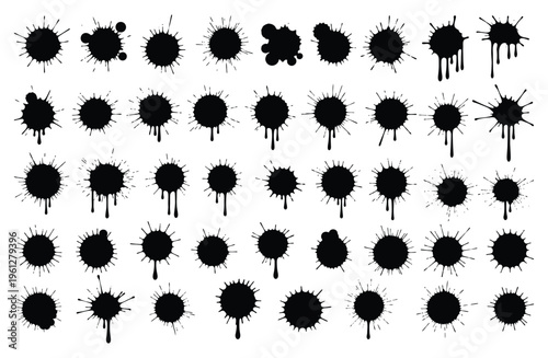 Collection of black ink splatters on white background