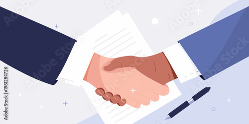 A diverse handshake symbolizes agreement over a document and a pen