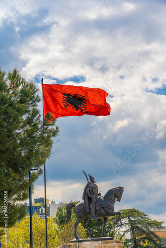Tirana Albania, Skanderbeg square and memorial, with Albania flag waving. 26 march 2026
