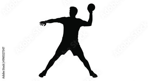 Handball player in action preparing to throw the ball silhouette
