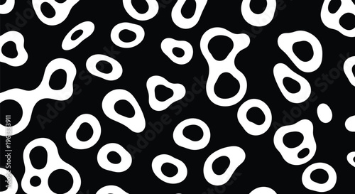 Abstract monochrome background featuring a pattern of organic fluid shapes with rounded contours