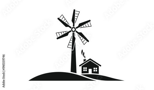 Silhouette of a windmill and house on a hill