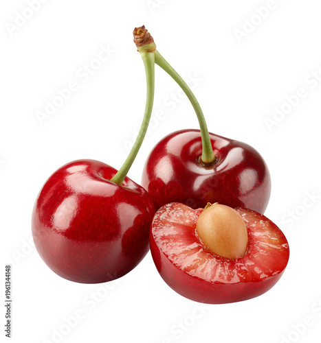 Three cherries with one cut in half and pit fruit juicy sweet isolated on a transparent background