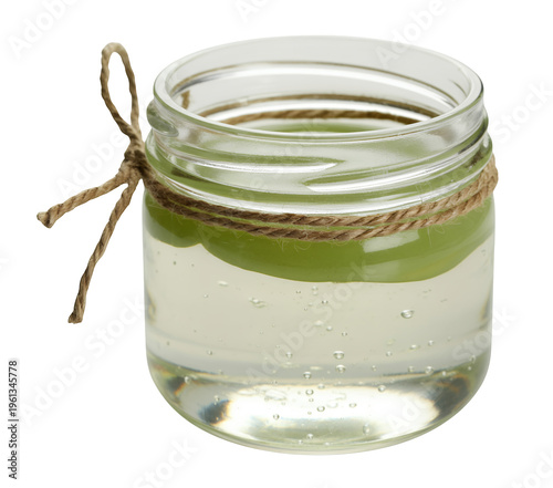 Aloe vera gel in a small glass jar with slice clear isolated on a transparent background