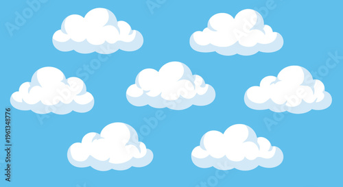 White clouds on a blue sky background.