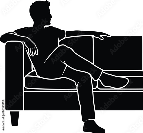 Man sitting on a couch in a relaxed position
