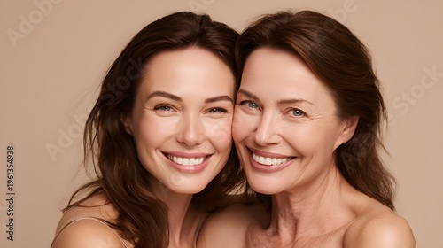 Beauty portrait of a senior and young woman with healthy skin. Natural aging skincare concept featuring a smiling mother and daughter for wellness and cosmetic branding.