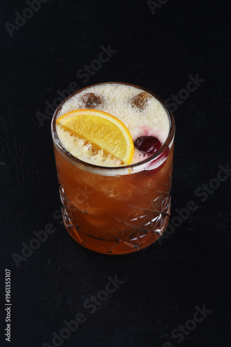 Alcoholic cocktail on a black background