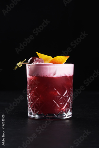 Alcoholic cocktail on a black background