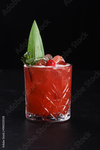 Alcoholic cocktail on a black background