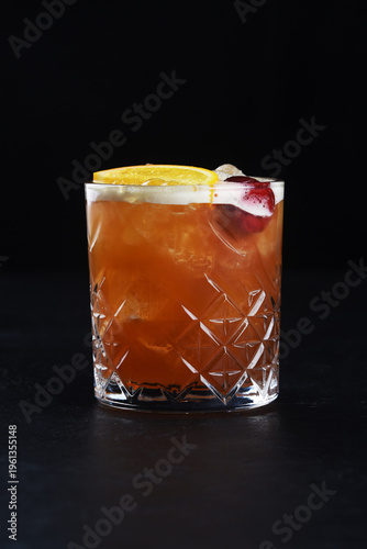 Alcoholic cocktail on a black background