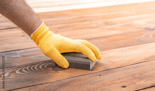 Wallpaper Mural Hand in yellow glove sands wooden floorboards Torontodigital.ca
