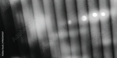 Abstract black and white background featuring soft vertical light streaks and glowing circular spots Vector, illustration