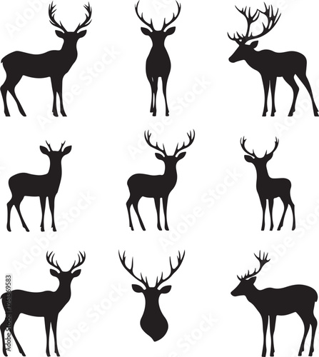 Silhouettes of deer with antlers standing.