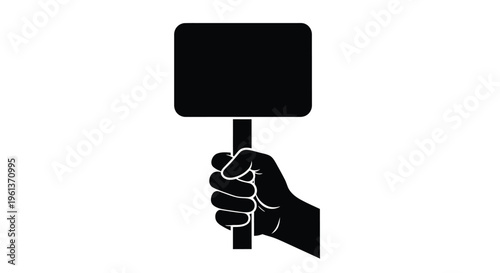 A hand firmly grasping a blank sign a striking silhouette