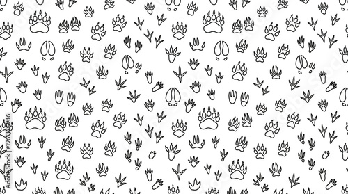 Seamless pattern of various animal paw and bird footprints on a white background