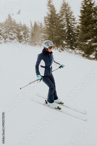 Skiing on a snowy slope in ...