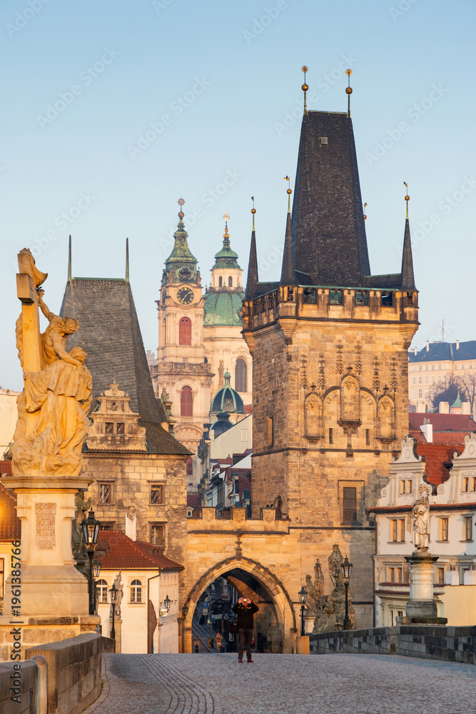 Fototapeta premium charles Bridge in Prague Czech Republic at sunrise with historic statues