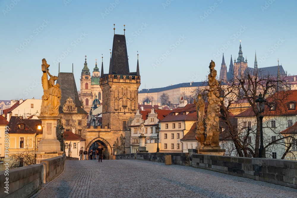 Fototapeta premium charles Bridge in Prague Czech Republic at sunrise with historic statues