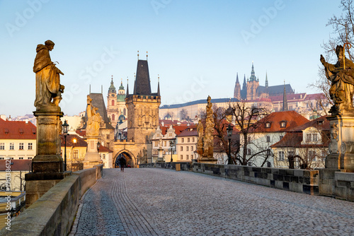charles Bridge in Prague Czech Republic at sunrise with historic statues