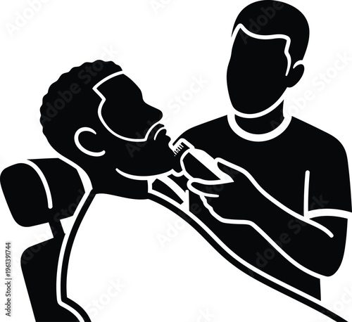 Man getting a haircut by a barber